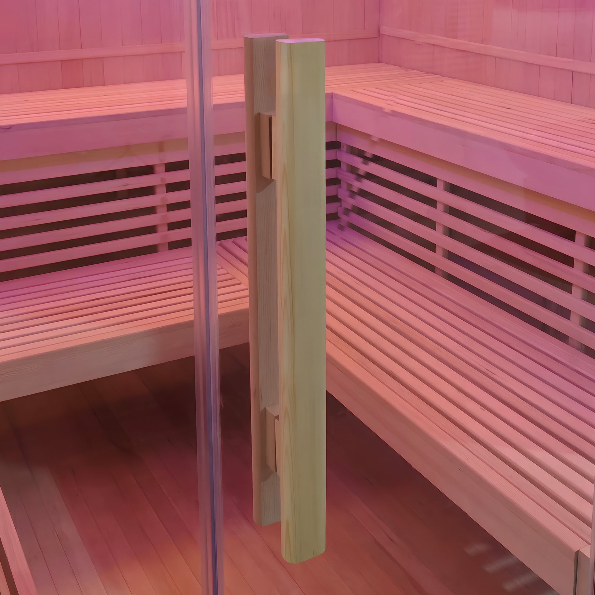 Close view of wooden sauna interior with glass door handle and bench seating