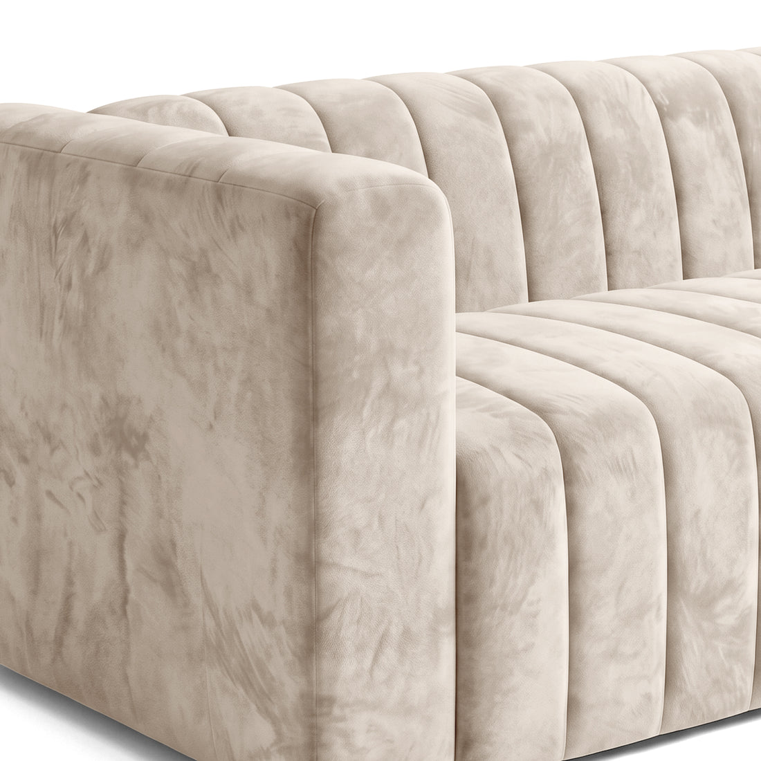 Close-up angled view of a beige channel-tufted sofa on a white background