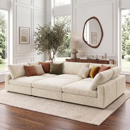 Beige sectional sofa styled in a modern living room