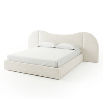 Modern upholstered cream bed with curved headboard on white background