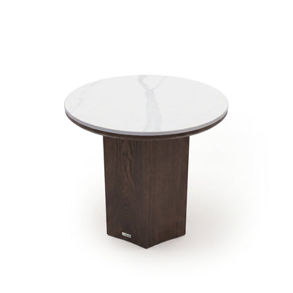 Round side table with a white marble top and dark wooden pedestal base on a white background