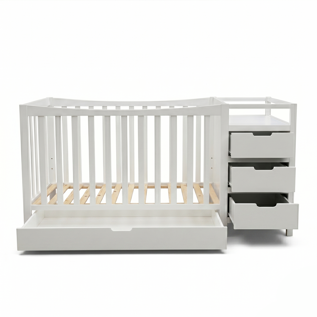 White baby crib with drawers and shelf on a white background