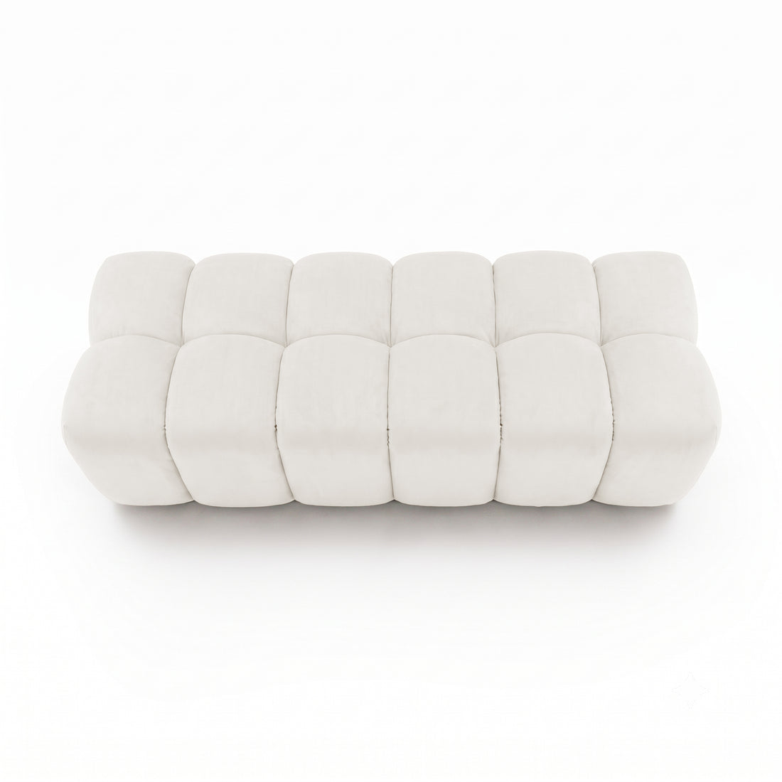 Light beige tufted rectangular bench viewed from above on a white background