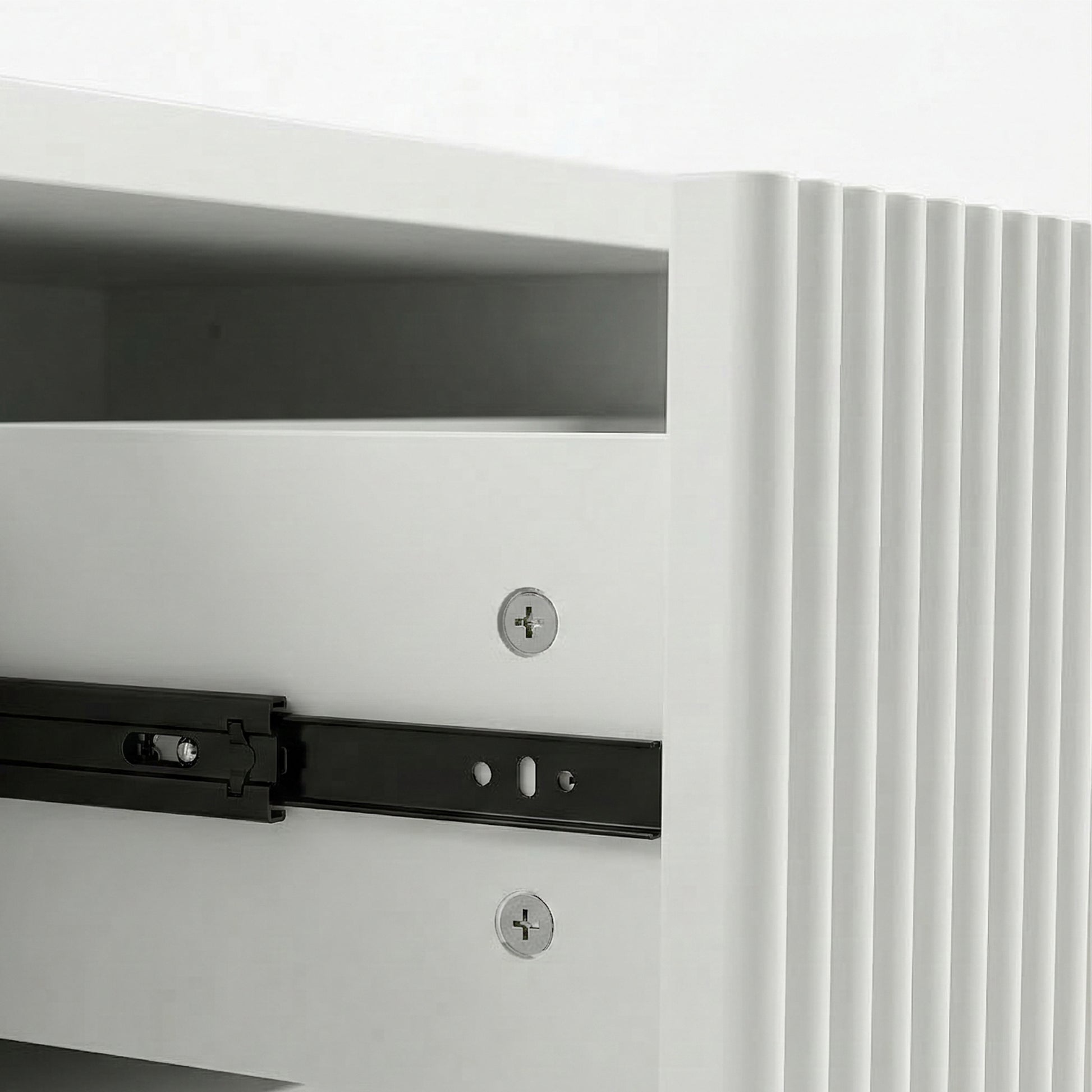 Close-up of cabinet interior hardware on white background