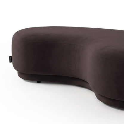 Dark contemporary curved upholstered bench seat on a white background