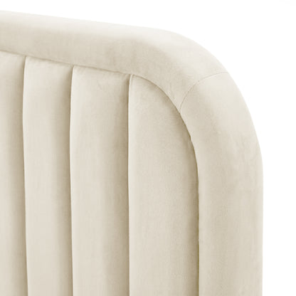 Close-up of upholstered headboard corner showing vertical channels