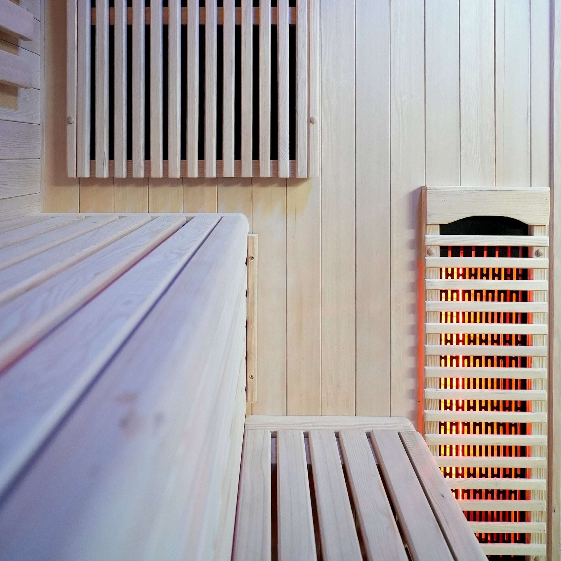Interior wood paneling and benches inside a sauna