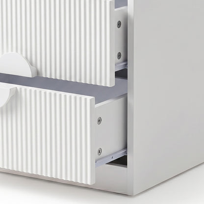 Close-up of open white drawers with visible hardware on white background