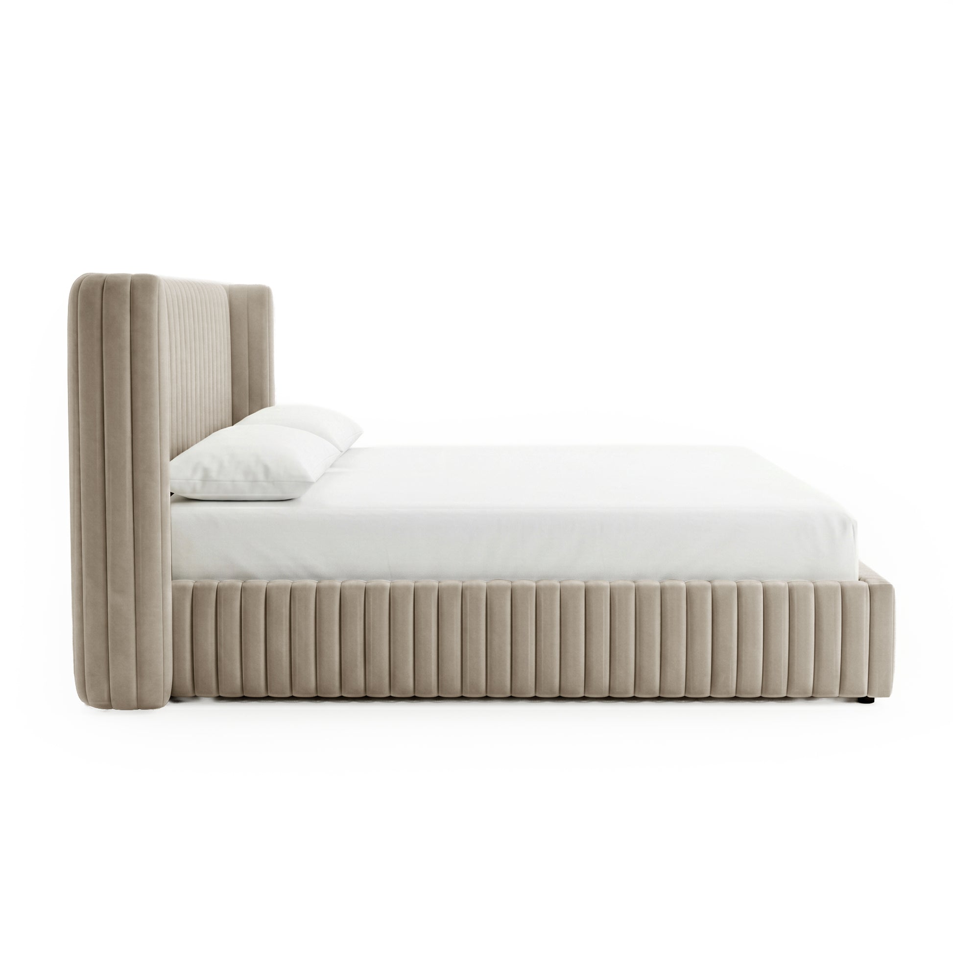 Side profile of beige upholstered king bed on white background