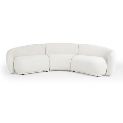 Modern curved white sofa on white background
