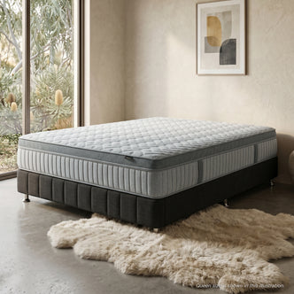 Mattress shown on a bed in a modern bedroom
