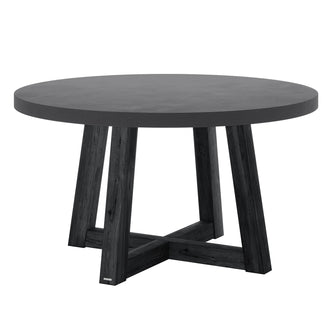 Magnus Hardwood and Concrete Outdoor Dining Table in Grey, featuring a thick round concrete top and four slightly splayed acacia wooden legs forming an X-shaped base, ideal for stylish alfresco dining.