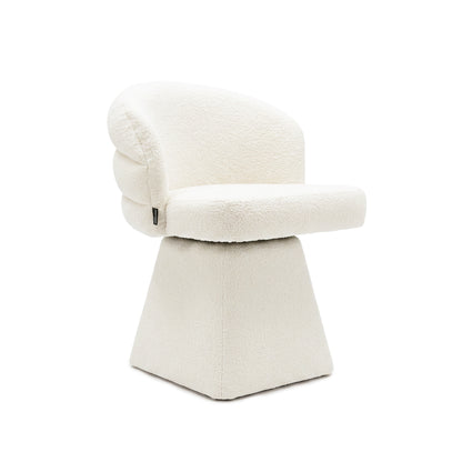 Modern plush white accent chair on a white background.