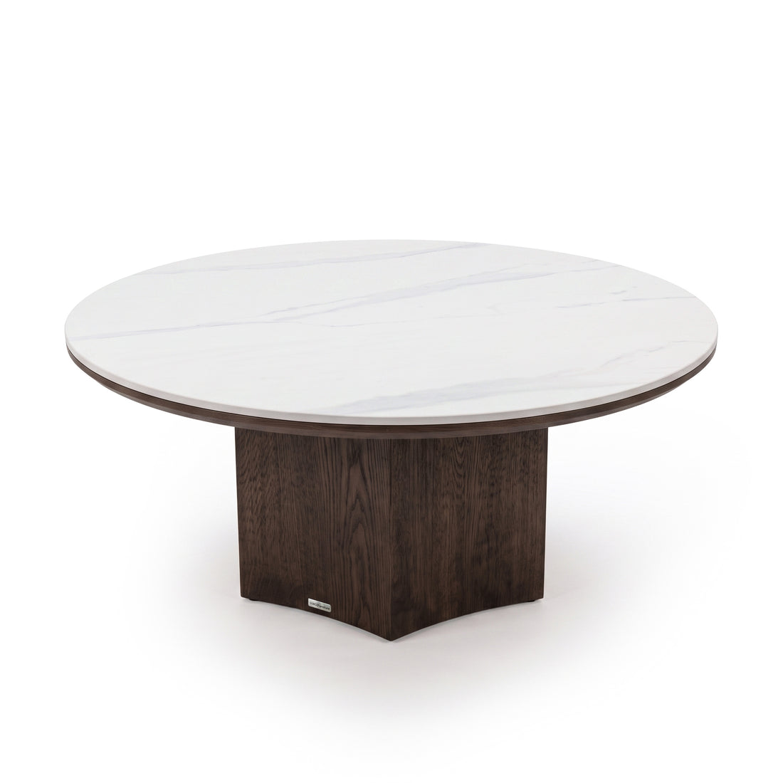 Modern round table with a white marble-effect top and dark square pedestal base on a white background