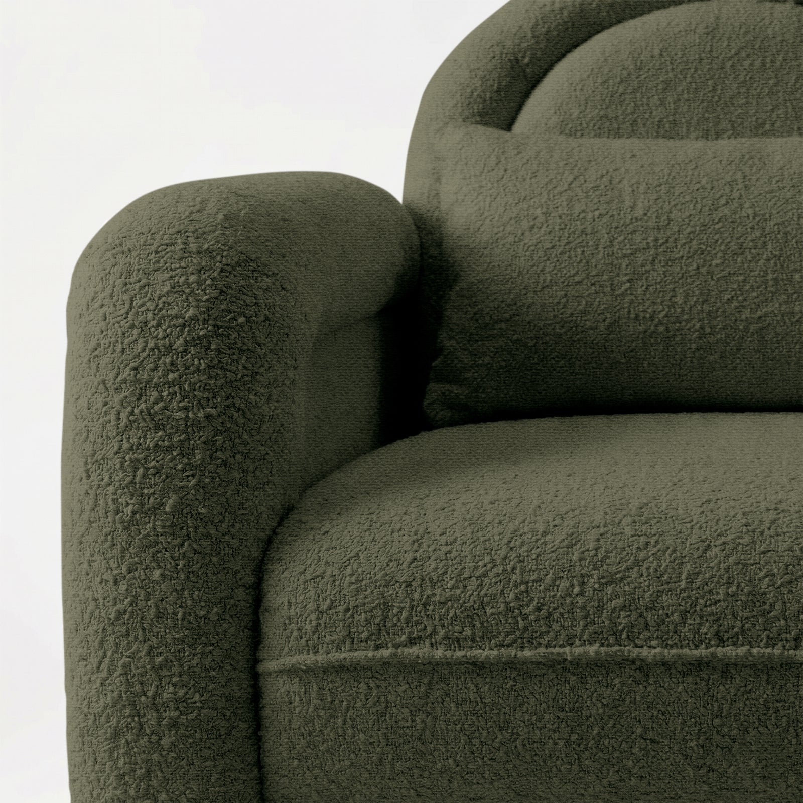 Close-up of olive green boucle fabric on armrest and backrest