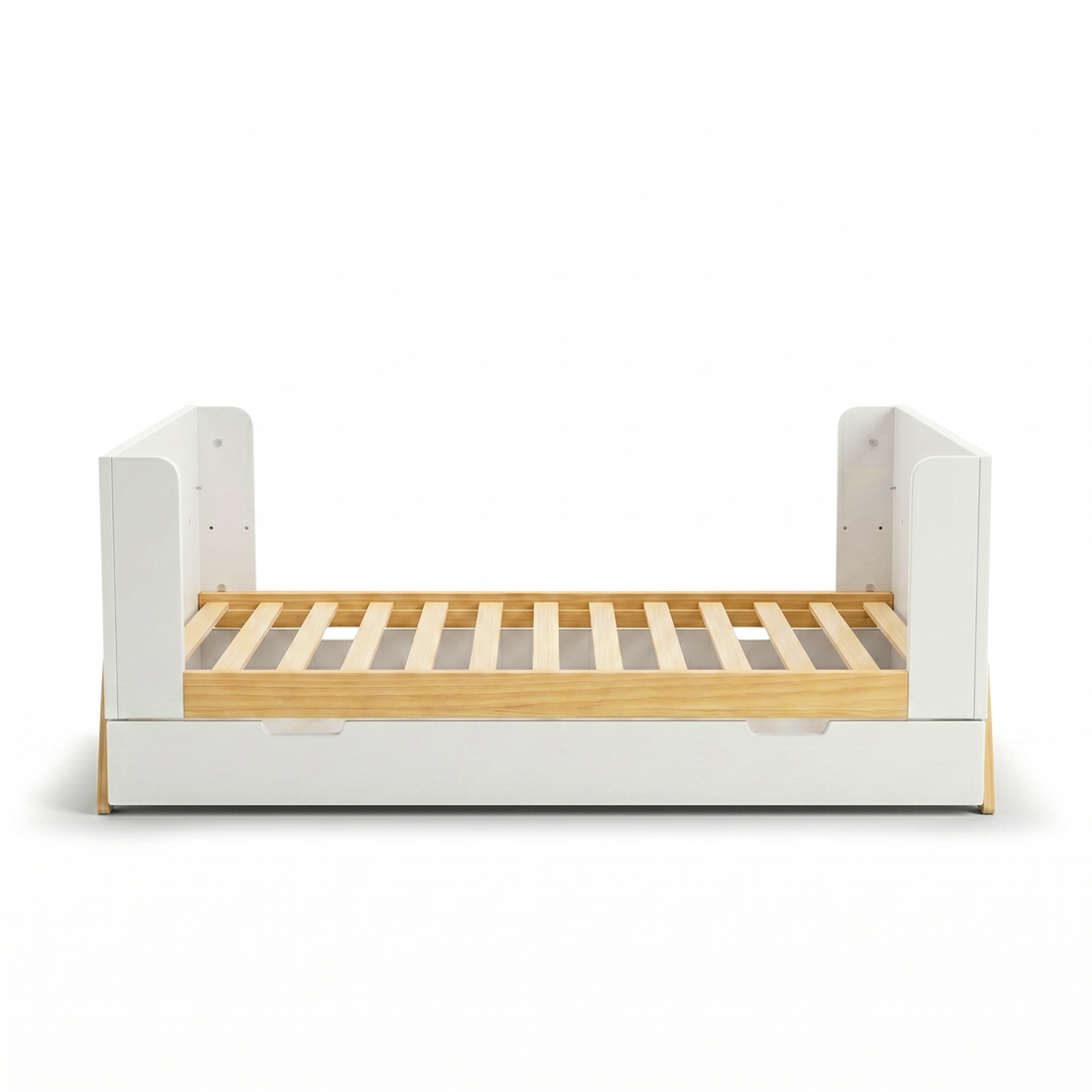 Children’s bed with white frame and wood slats on white background