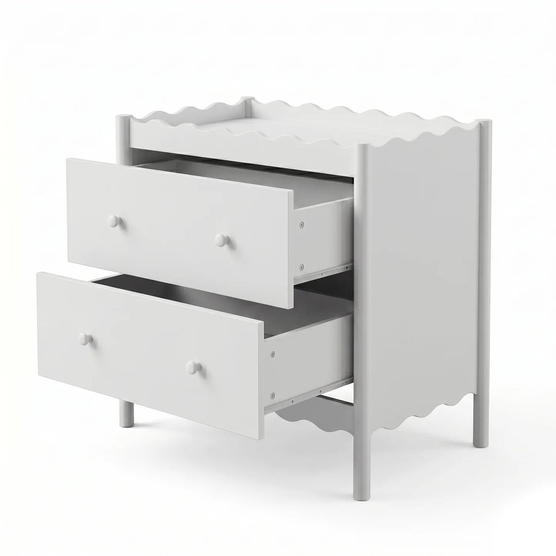 A white two-drawer baby change table featuring a decorative scalloped edge on the top surface and the base, complemented by simple round knobs.
